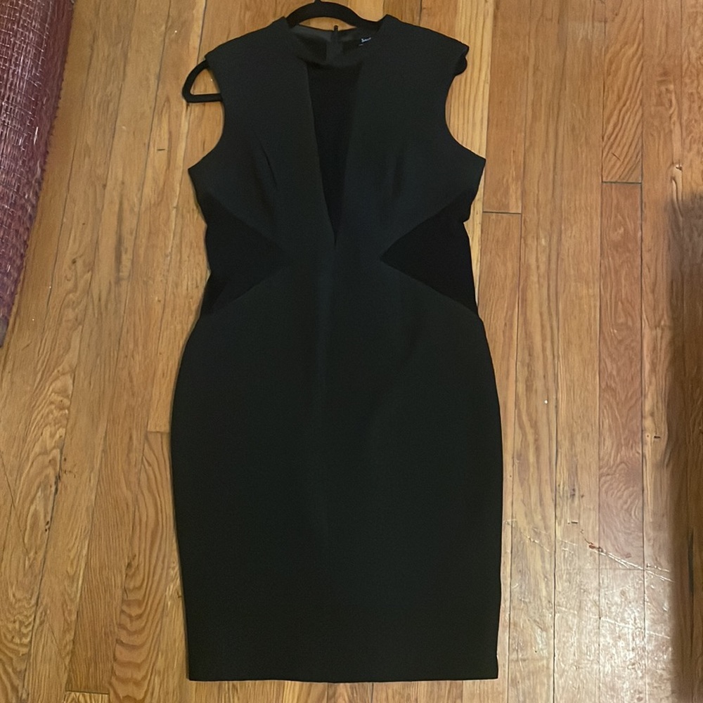 NWT Beautiful elegant black bodycon dress with lace on the sides